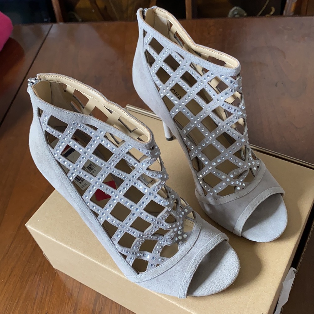 05:08  - Michael Kors Embellished Suede Cage Booties